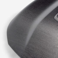 Seibon 2023+ Toyota GR Corolla OE-Style Carbon Fiber Hood - Gloss Finish (HD23TYGRCOR-OE)
