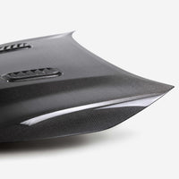 Seibon 2023+ Toyota GR Corolla OE-Style Carbon Fiber Hood - Gloss Finish (HD23TYGRCOR-OE)