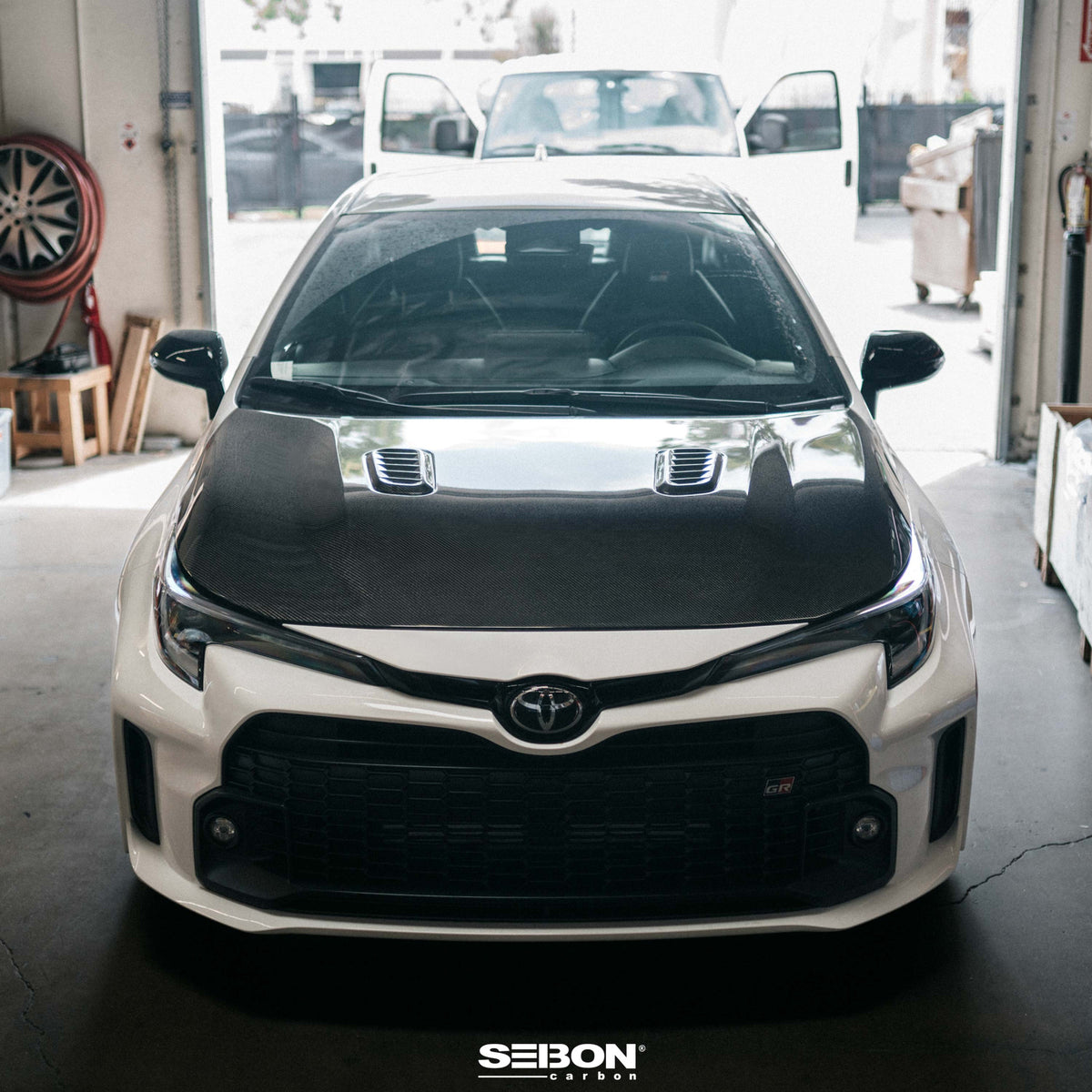 Seibon 2023+ Toyota GR Corolla OE-Style Carbon Fiber Hood - Gloss Finish (HD23TYGRCOR-OE)