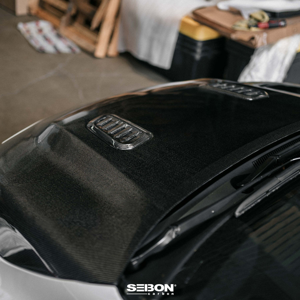 Seibon 2023+ Toyota GR Corolla OE-Style Carbon Fiber Hood - Gloss Finish (HD23TYGRCOR-OE)