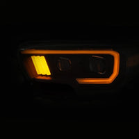 ANZO 2016-2021 Toyota Tacoma Proyector Faros delanteros con estilo de tablón Switchback negro con ámbar con DRL